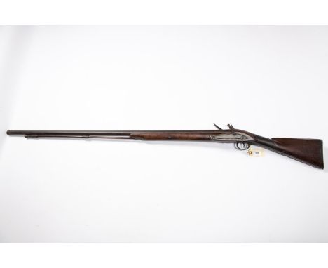 A late 18th century 10 bore flintlock fowling piece, by Hunt of Colchester, barrel 42" with London proofs, flat stepped lock 