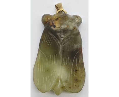 A Chinese jade carving in the form of a moth, 14ct gold clasp, L.5cm