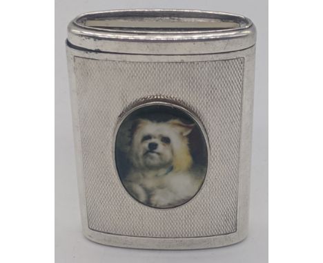 A silver vesta case mounted with enamel portrait of a Terrier dog, engine turned to front and back, hallmarked Birmingham, 19