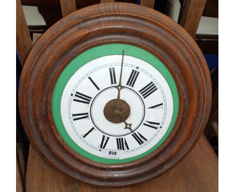A 20TH CENTURY WALL HANGING CLOCK with a white face.