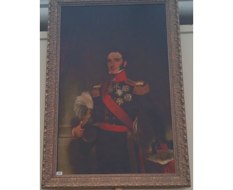 A LARGE PAIR OF COLOURED PORTRAIT PRINTS of military men in ornate gilt frames. 38" x 58.5".