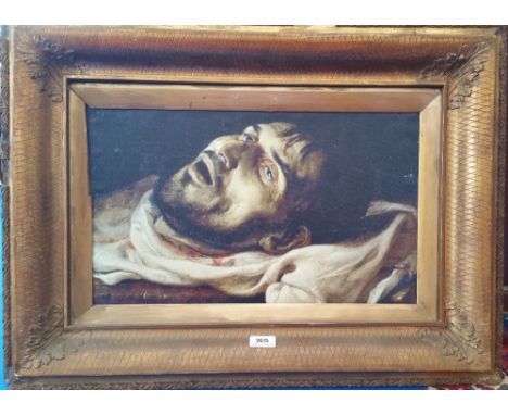 A.T.O. A COLOURED PORTRAIT of a man's head in an ornate 19th century frame. 29.5" x 22".