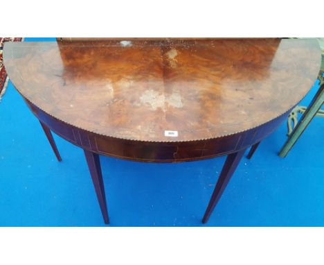 A LATE 18TH EARLY 19TH CENTURY MAHOGANY HALF MOON SIDE TABLE with sunburst veneered top on square tapered supports. Circa 179