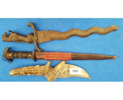 THREE VINTAGE PROP KNIVES, one cast iron.