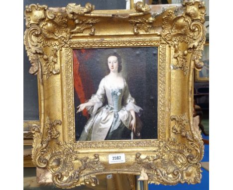 A.T.O. A COLOURED PORTRAIT PRINT of a young woman in a highly ornate 19th century frame. 14.5" x 15.5".