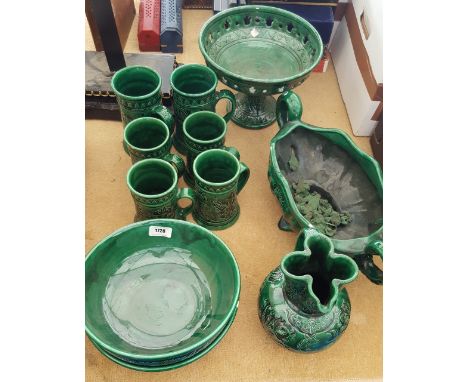 A QUANTITY OF GREEN GLAZED CERAMIC WARE.