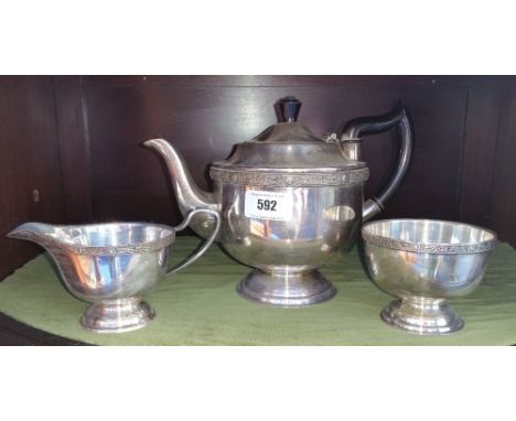 A VINERS OF SHEFFIELD THREE-PIECE CELTIC DESIGN TEA SERVICE.