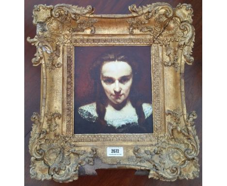 A.T.O. A COLOURED PORTRAIT PRINT of a woman in a period 19th century frame. 15" X 16".