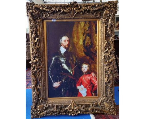 A.T.O. A LARGE COLOURED PORTRAIT PRINT of a military man and his sone in a very ornate gilt frame. 40" x 51.5".