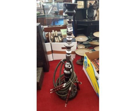 A BLACK AND CLEAR GLASS HOOKAH. (Dorian's Portrait room)(chip to top).