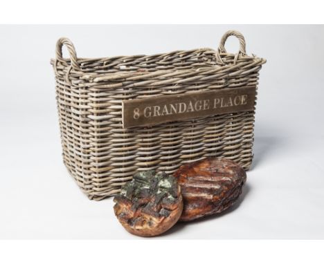 HERO LOT: A WICKER BASKET WITH ATTACHED PLAQUE '8 Grandage Place' (Sir Malcolm's address, *Bread Loaves are props. Not to be 