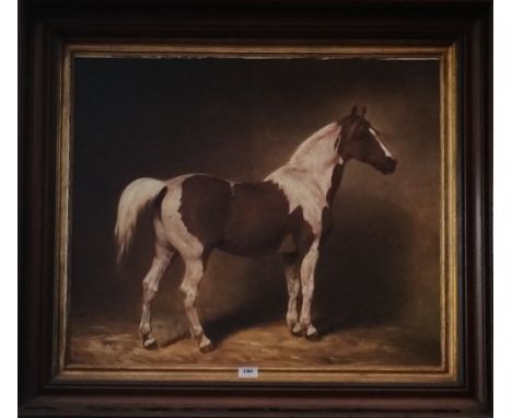 A.T.O. A COLOURED PRINT of a piebald horse in a deep frame. 38" x 33.25".