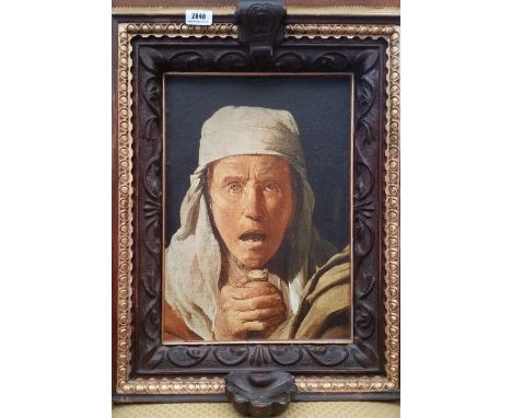 A LARGE COLOURED PORTRAIT PRINT of a woman praying, in a medieval style oak frame. 17.25" x 22.25".