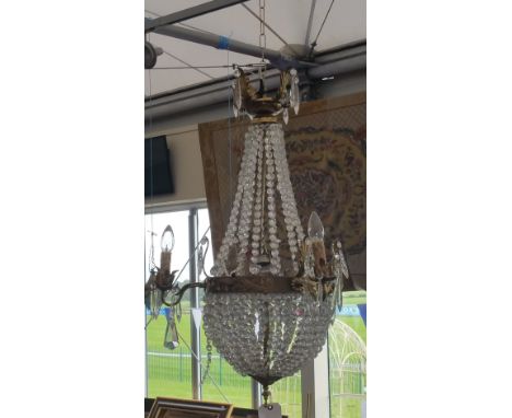 A WONDERFUL CAST BRASS AND CRYSTAL BASKET CHANDELIER having three external branches, of neat proportions.