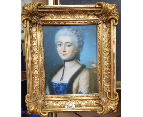 A.T.O. A COLOURED PORTRAIT PRINT of a young woman in a highly ornate 19th century frame. 14" x 16".