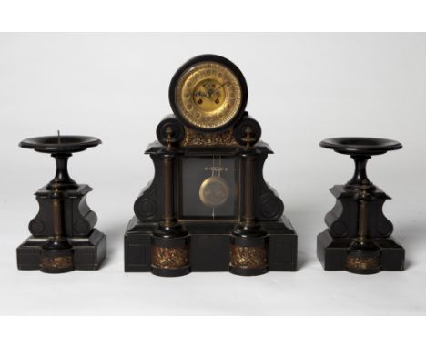 A WONDERFUL FRENCH VICTORIAN BLACK MARBLE MANTEL CLOCK GARNITURE with gilt brass panels depicting cherubs, a brass face and f