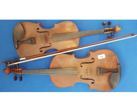 TWO VIOLINS (distressed) and one bow.