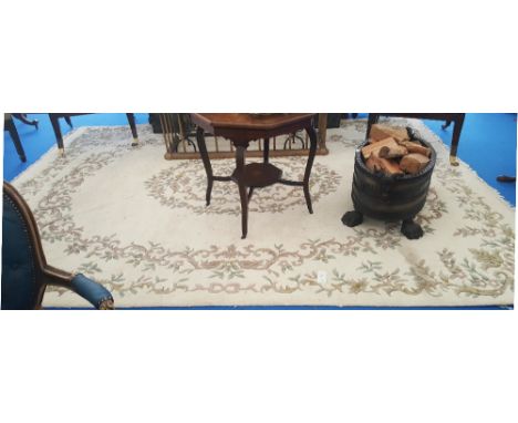 A LOVELY FLORAL CREAM GROUND WOOL CARPET with leaf decoration. 12' 4" x 8' 10".