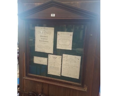 A WONDERFUL 19TH CENTURY MAHOGANY CHURCH NOTICE BOARD with glazed door and architectural pediment.