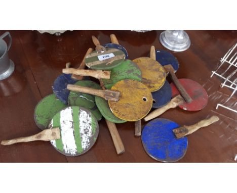 PROPS: A QUANTITY OF VINTAGE PADDLES (used in an auction).