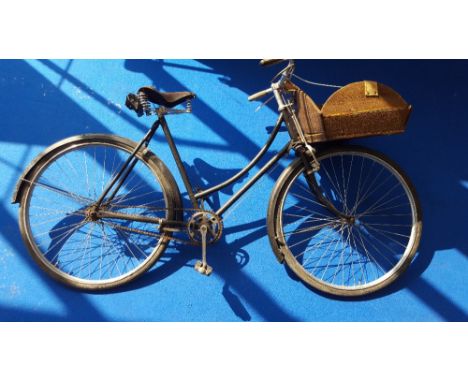 A GOOD VINTAGE LADIES BICYCLE.