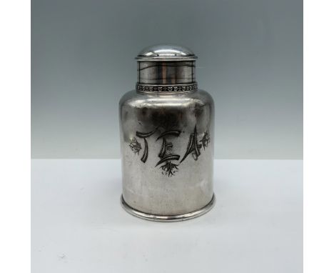 Beautifully crafted vintage silverware tea canister that features intricate detailing and a graceful, sturdy design. James W.