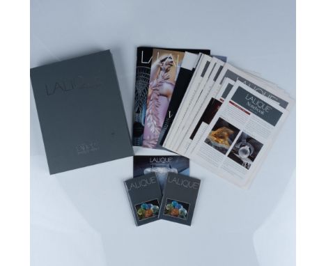 A large collection of art journals for the French luxury glassmaker, Lalique. Collection includes of (3) 1995 Lalique Noteboo