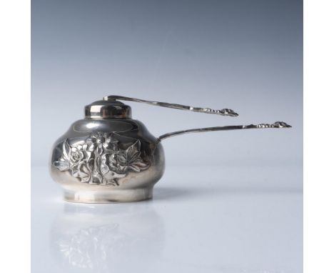This sterling silver tea caddy, marked 925 Sterling and Handarbeit on the base, features finely crafted floral embellishments