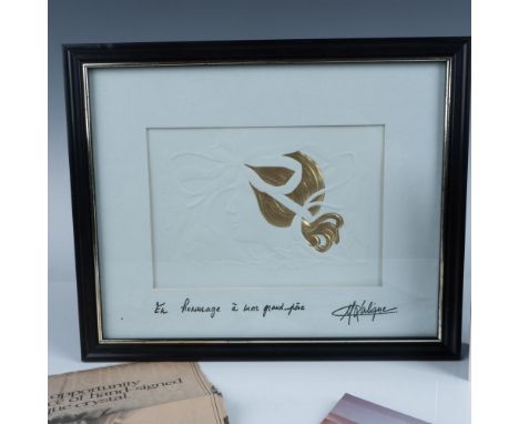Housed in a black and silver acrylic frame and a thick white matte. Features a white Art Nouveau embossed image of a woman su