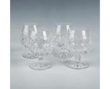 A magnificent collection of cognac glasses featuring a wide tapered round bowl with a short stem, cut with a straight and dia