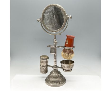 Unique step back in time to see this all-in-one shaving station. Engraved brass stand has built in swivel mirror, shaving bru