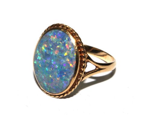 An opal ring set in 9 carat gold 