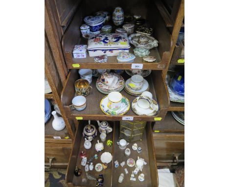 A small collection of cabinet cups and saucers, a commemorative heart shape box for Govier's of Sidmouth by Royal Crown Derby