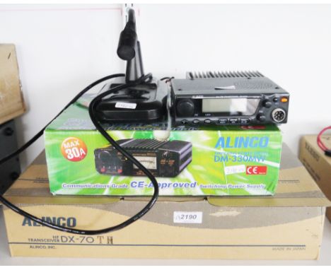 Alinco DX-70 HF transceiver, a DR-M06 model, an Alinco DM-330 MW power supply&nbsp;and an EMS-14 desk top microphone (4)&nbsp