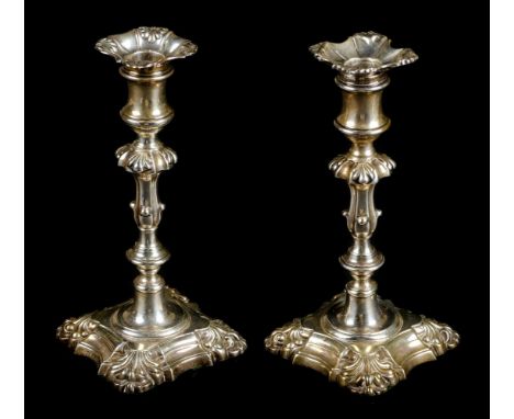 Candlesticks. A pair of William IV silver candlesticks by Henry Wilkinson &amp; Co, Sheffield, 1836 / 1839, with acanthus mou