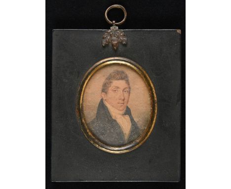Miniature. Portrait of a Regency gentleman, circa 1800, watercolour on card, oval head and shoulders portrait of a young gent