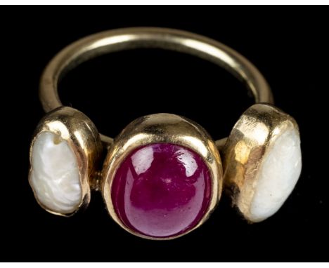 Ring. A 9ct gold ring, set with a cabochon ruby flanked by blister mabe pearls, size L, overall weight 5.4g (Qty: 1)