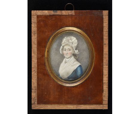 Miniature. Portrait of a woman in a mob cap, circa 1800, watercolour and bodycolour on ivory, oval bust length portrait of a 