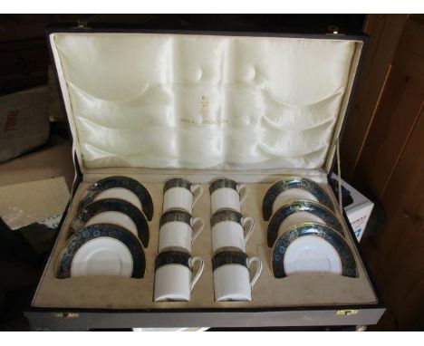 A boxed Royal Doulton 'Carlyle' set of coffee cans and saucers 