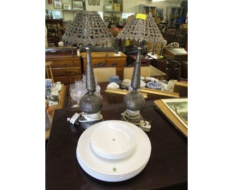 A pair of metal lamps, together with ceramic plates 