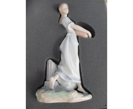 A Lladro Privilege Society 2004 figure of a flower girl, boxed 