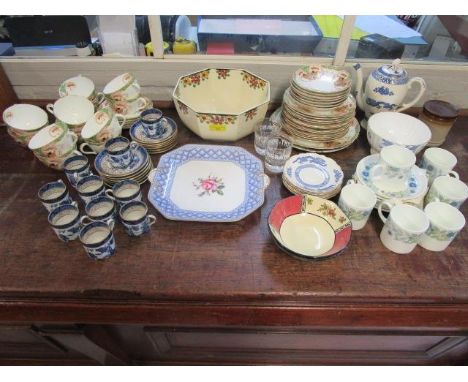 A quantity of table ceramics to include Booths Real Old Willow coffee cans and saucers, Wedgwood Clementine coffee cans and s