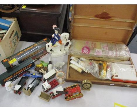 A mixed lot to include a Staffordshire flatback, a boxed Eddie Stobbart lorry, ceramic bottle stoppers and other items 