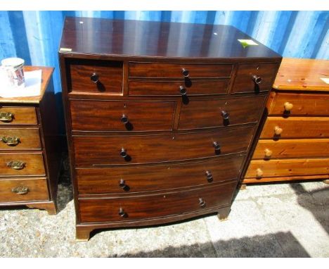 A mid 20th century mahogany chest of drawers, standing on bracket feet, 42 1/2" h x 37" w 