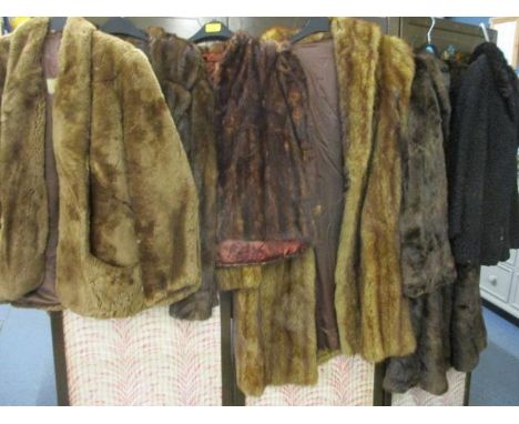 A vintage Astrakhan jacket, two fur opera capes, a Tuscan fur jacket, a three quarter length fur coat and one other 