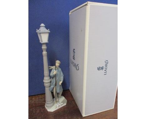 A Lladro Lamplighter figure 