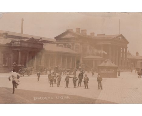 An album containing approximately 202 postcards, the majority British topographical views, including photographic postcards t