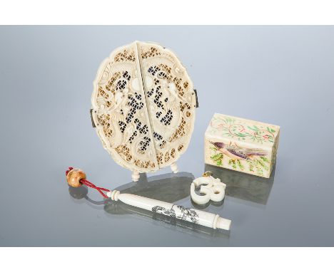CHINESE CANTON IVORY PHOTOGRAPH FRAME
with two double doors opening to reveal a portrait oval, with pierced dragon decoration