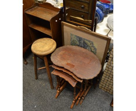 A reproduction nest of three tables by Cameo Furniture, kidney shaped piecrust top; a floor standing oak three tier bookcase;