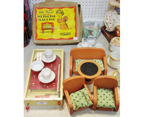 The BCM The Diane miniature Wringing Machine, boxed; a child's tea service;  a wooden three piece suite